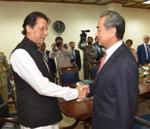Imran-Wang-Yi-hand-shake