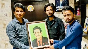 cropped-Muhammad-Hasan-Samejo-presented-Portrait-to-Rizwan-Jaffer-Founder-and-Chairman-Youth-Parliament.jpeg