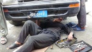 Children working in Chitral auto repair shops (1)