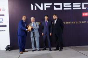 Syed Irfan Ali, Managing Director, Deposit Protection Corporation receiving memento from Dr Ishrat Husain during 13th InfoSec Conference held in Karachi. Dr Sohail Rajput Federal Secretary IT & Telecom an