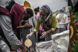 Emergency food distribution in Mekelle, the capital of EthiopiaÕs Tigray region, on June 26, 2021. (Finbarr O'Reilly/The New York Times)