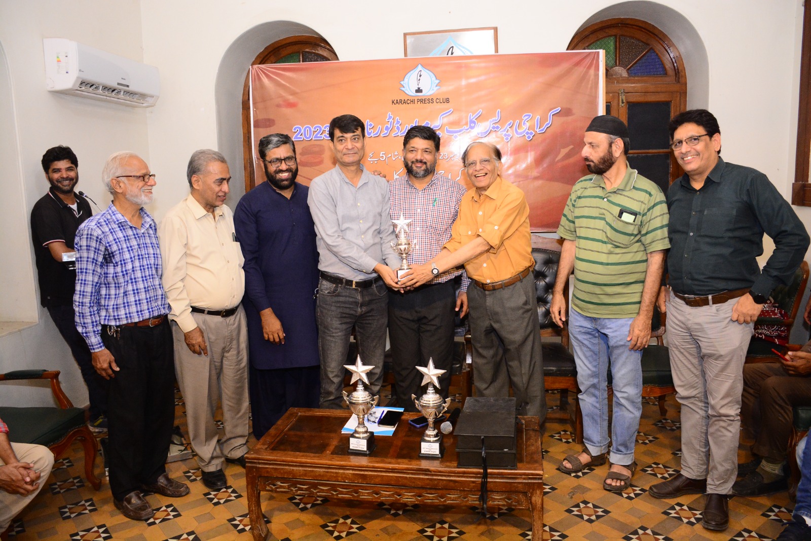 PAPP congratulates winners of carom board tournament.