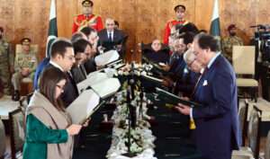 Pakistans new cabinet takes over a divided nation facing an economic crisis