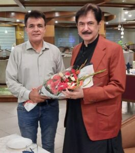 Syed Turab Shah Congratulates Dr. Khalid Shaikh at Beach View Club.