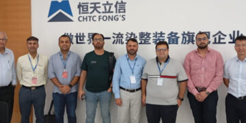 Group photo of Rizwan Lakhany Director of Lakhany Silk Mills, Kamran Lakhany, K.M Khalid and other businessmen during the business trip to China.