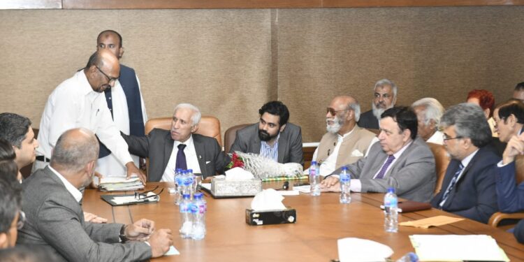 PERFORMANCE REVIEW MEETING AND KHULI KACHEHRI CHAIRED BY MINISTER OFMARITIME AFFAIRS.QAISER AHMED SHEIKH.