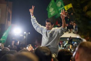 a-palestinian-prisoner-flashes-the-v-sign-for-victory-upon-his-arrival-in-the-occupied-west-bank-tow-1737344433-1643