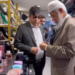 Dr. Zakir Naik is shopping at the outlet of Pakistan’s prominent businessman Shahzad Mubeen in a local shopping center.