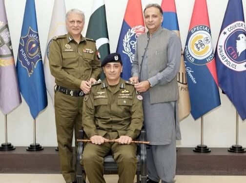 Inspector General of Punjab Police Dr. Usman Anwar pins ranks on District Police Officer Mandi Bahauddin, Ahmad Mohiuddin, upon his promotion.