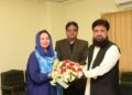 Mrs. Irum Tanweer was graced with bouquet of flowers by the officers of Press Information Department