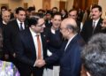 Hamza Tabani, is shaking hands with President Asif Ali Zardari