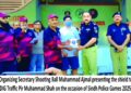 Ball Muhammad Ajmal presenting the shield to DIG Traffic Pir Muhammad Shah on the occasion of Sindh Police Games 2025.