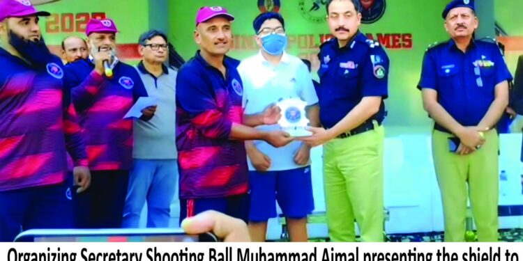 Ball Muhammad Ajmal presenting the shield to DIG Traffic Pir Muhammad Shah on the occasion of Sindh Police Games 2025.