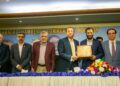 Muhammad Rehan Hanif presenting crest to Federal Minister for National Health Services Regulation and Coordination Syed Mustafa Kamal during his visit to KCCI on Monday.