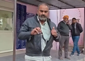 Man bitten by snake reaches hospital with snake wrapped in jacket.