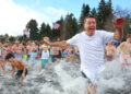 Thousands of People Took a Dip in the Cold Water to Set a Record.