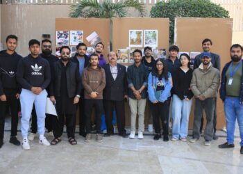 Group photo of Professor Rehmat Khan with students at the University of Greenwich’s