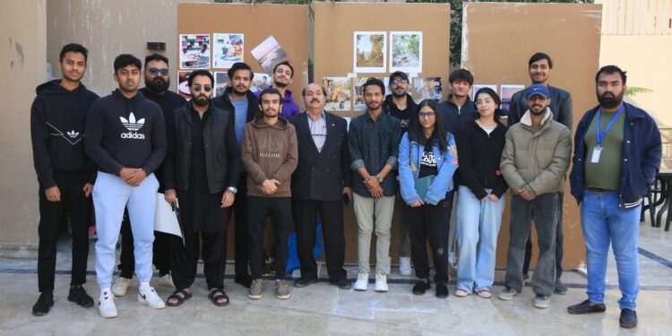 Group photo of Professor Rehmat Khan with students at the University of Greenwich’s