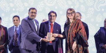 Abdul Hameed Aslam  Rceived award from Christine Etienne Director Rotary International