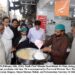 Sindh Chief Minister,during his visit to Burns Road, purchases dahi bara.