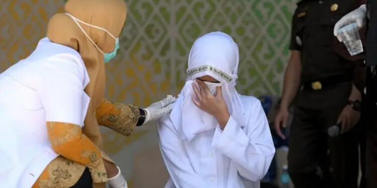 Couple in Indonesia publicly flogged 140 times for drinking alcohol and having sex outside of marriage.