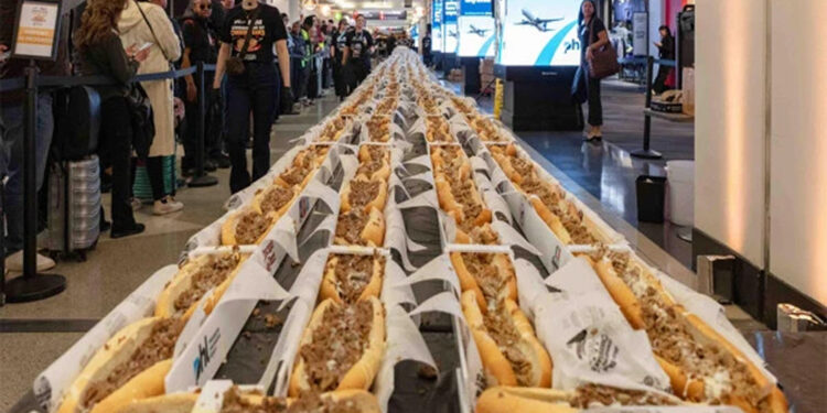The world’s largest cheesesteak line.