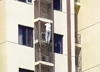 Video of 89-year-old woman falling off railing while locked in room.