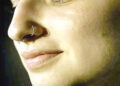 Part of nose ring gets stuck in woman’s lung.