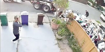 Truck’s garbage dumped on customer’s lawn for non-payment of bill.