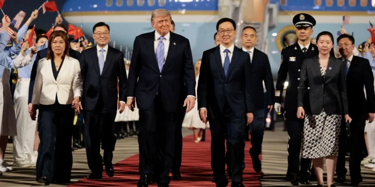 Donald Trump lands in China for high-stakes talks