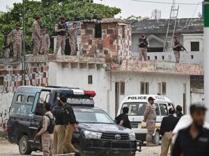 Pakistani security forces deployed near the Rangers camp after a militant attack in Karachi.
