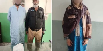 Police in Karachi Kemari showing recovered hashish after arrest of husband and wife in drug trafficking raid.