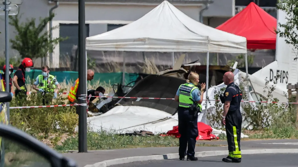 Emergency services at the crash site of a civilian skydiving aircraft in Tomblaine, eastern France.