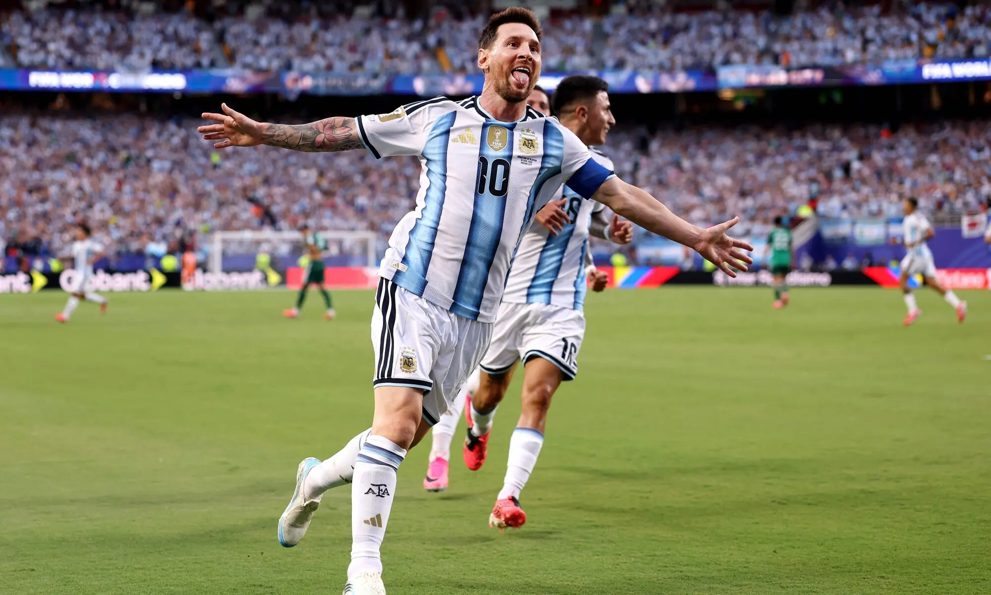 Lionel Messi celebrating after scoring a hat-trick for Argentina