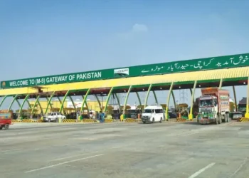Motorway police checking fire extinguishers in passenger and cargo vehicles.