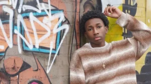 Teenagers creating social media content while UK government discusses under-16 ban
