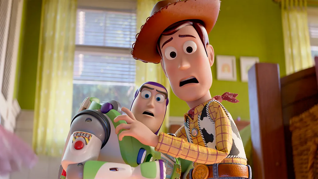 Toy Story characters reacting to a glowing tablet representing digital media.
