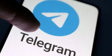 Telegram logo with Indian court and student protest over NEET exam leak
