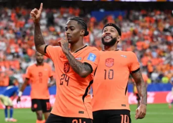 Netherlands players celebrate after defeating Sweden 5-1 in their World Cup group match