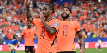 Netherlands players celebrate after defeating Sweden 5-1 in their World Cup group match