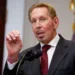 Oracle office building and data centre infrastructure representing job cuts and AI expansion in tech industry
