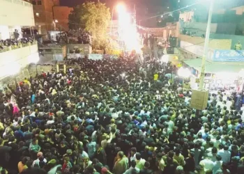 Emergency response and treatment following vehicle crash at Muharram gathering in Karachi.