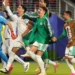 Algeria players celebrating after scoring a late winning goal against Jordan in World Cup match