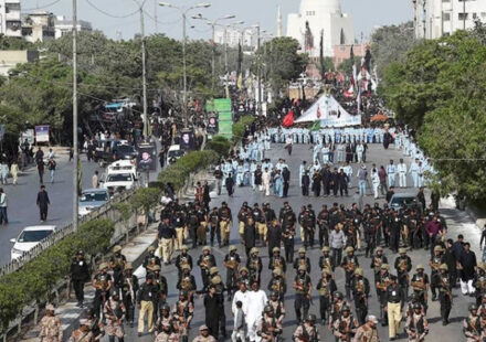Sindh Police officers monitoring security arrangements during Ashura processions in Karachi.