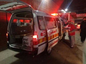 Rescue operation at the scene of a dumper and motorcycle accident in Karachi