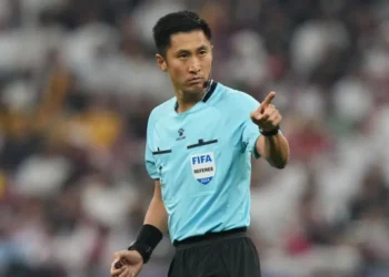 Chinese referee Ma Ning prepares for World Cup duties.