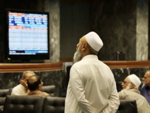 Electronic board displays rising KSE-100 index at Pakistan Stock Exchange.