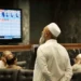 Electronic board displays rising KSE-100 index at Pakistan Stock Exchange.