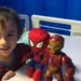 Child undergoing teplizumab infusion in hospital to delay onset of type 1 diabetes.