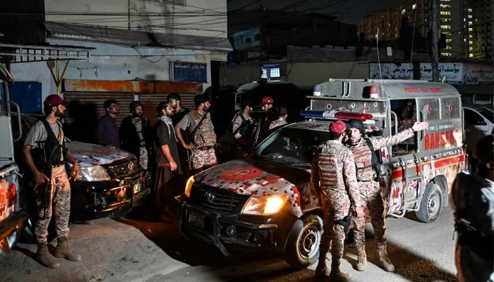 Pakistan Rangers personnel conducting security operations following the attack in Karachi.
